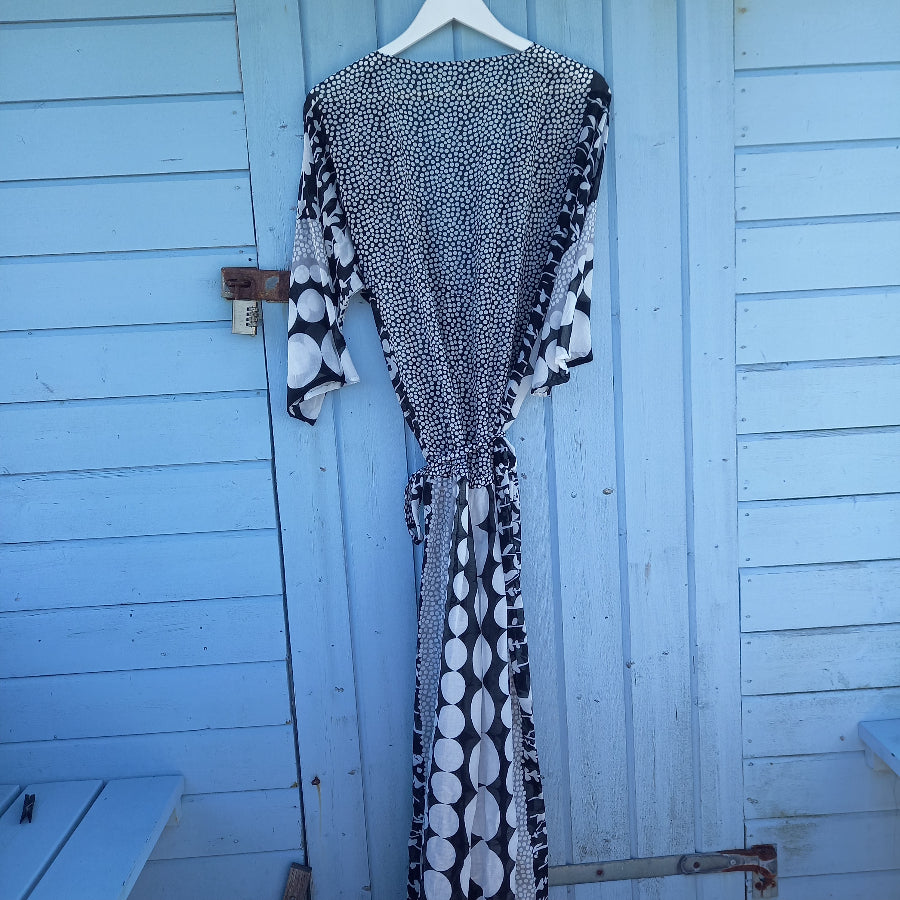 Ragazza dress back view showing lightweight silk cotton fabric detail
