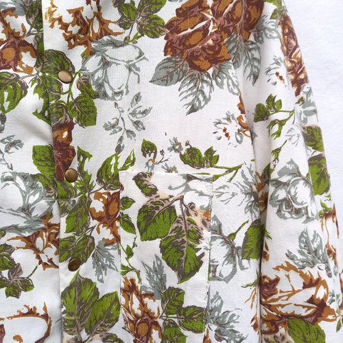 Fanny bathrobe close-up of vintage cotton damask fabric and rose print
