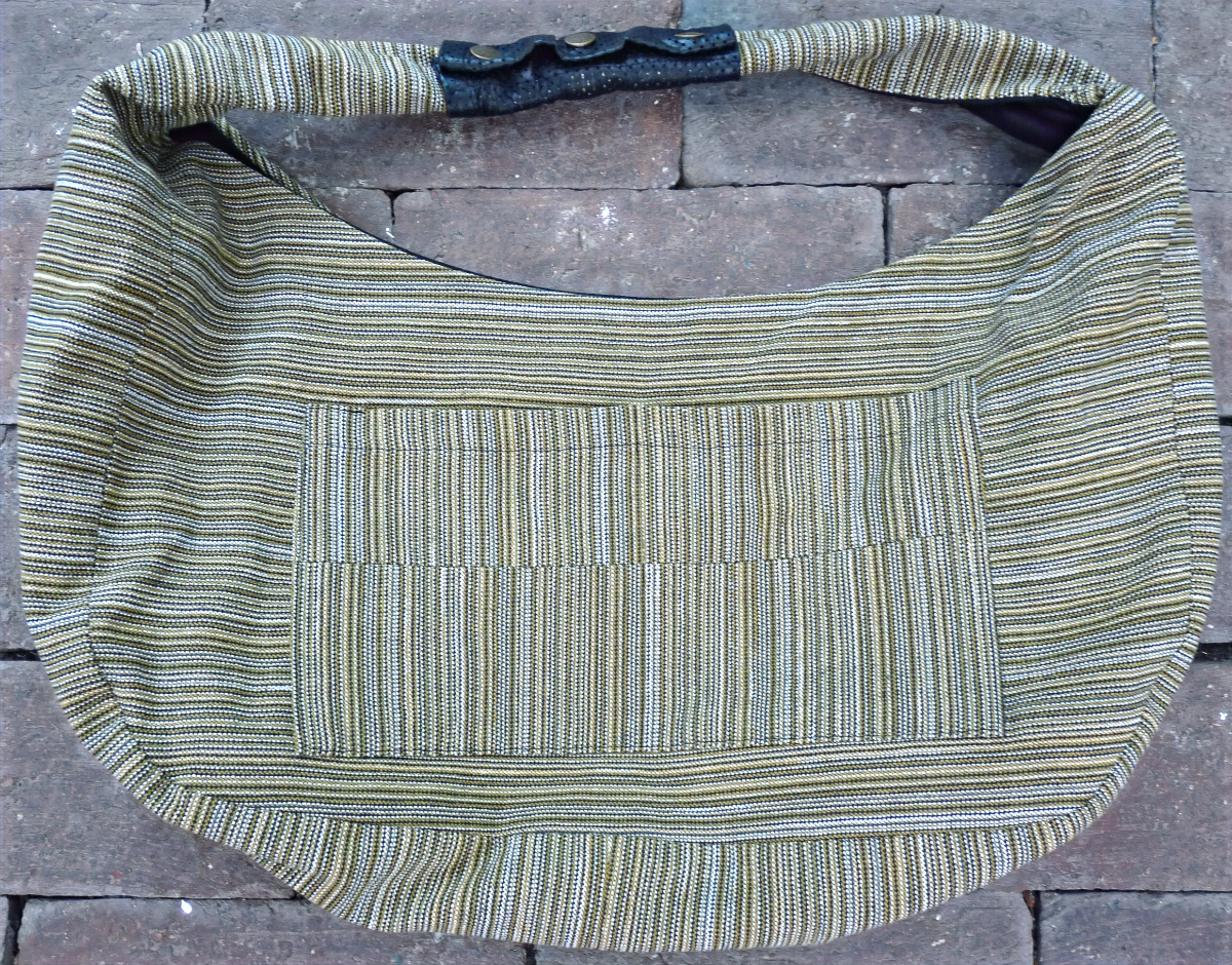 Santa Maria del Camí bag side view showing authentic Mallorcan textile from Bujosa
