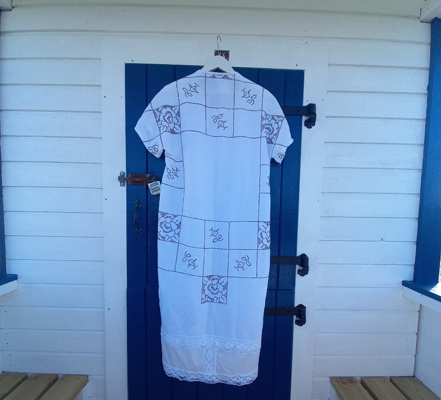 Serenita dress back view showing vintage tablecloth fabric and lace detail
