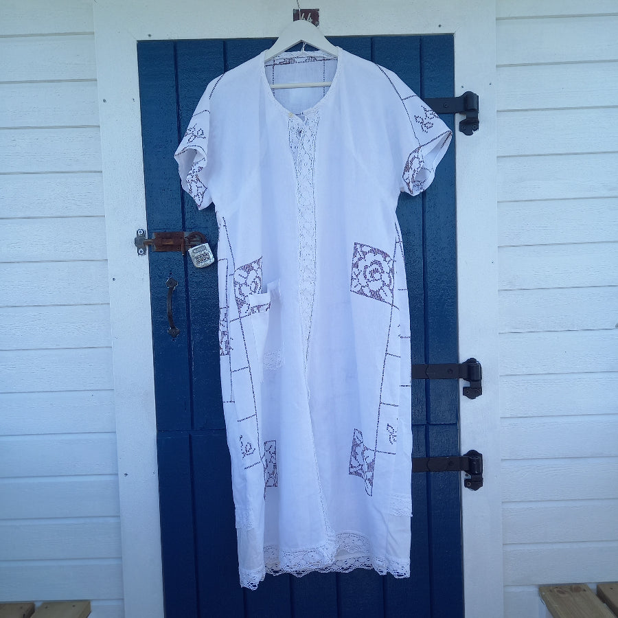 Serenita dress front view of cotton lace and vintage textile detail
