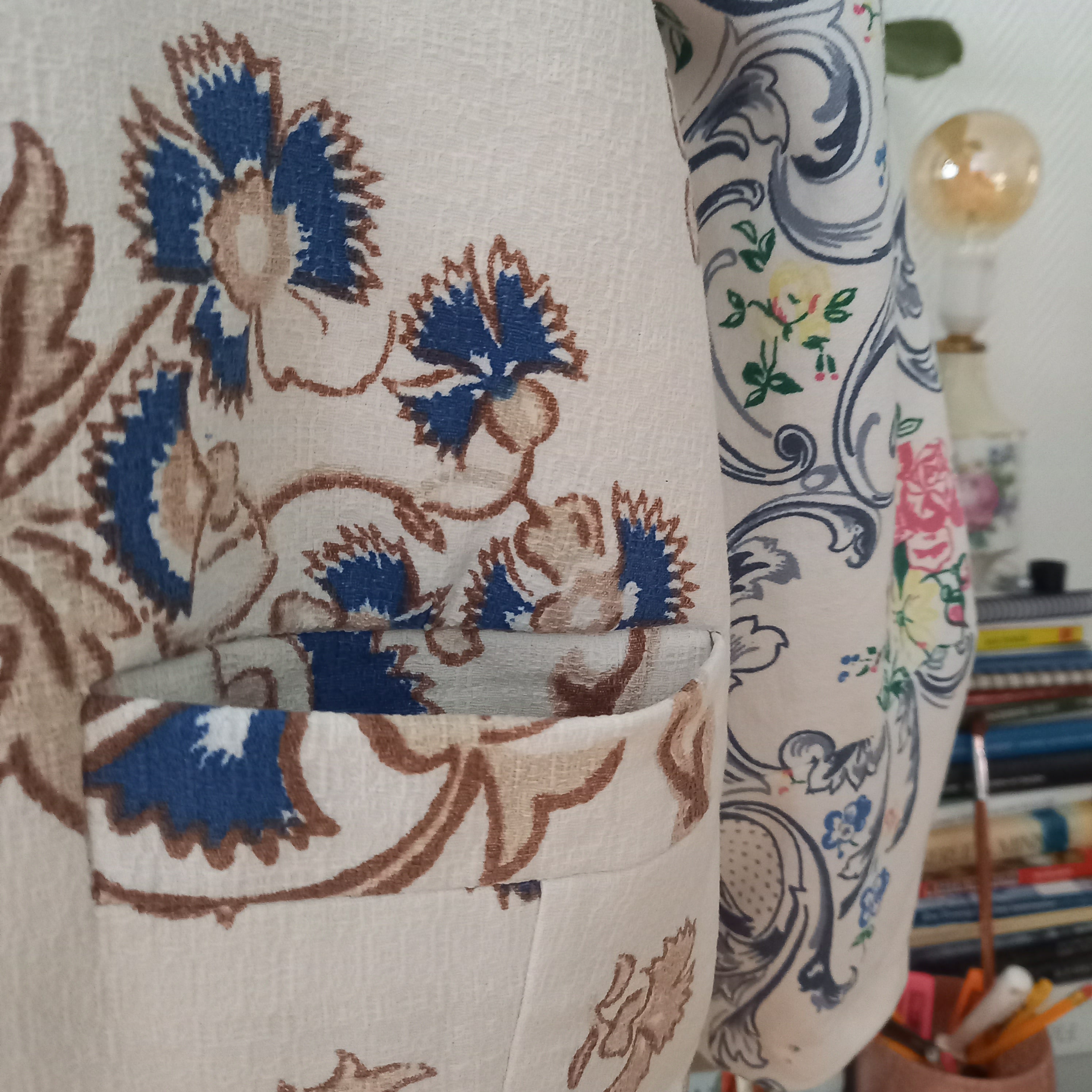 Rosalia jacket close-up of vintage tablecloth fabric and damask lining
