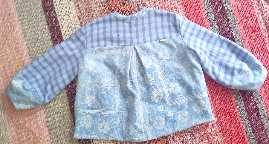 Cesaria jacket back view showing vintage cotton tablecloth textile detail
