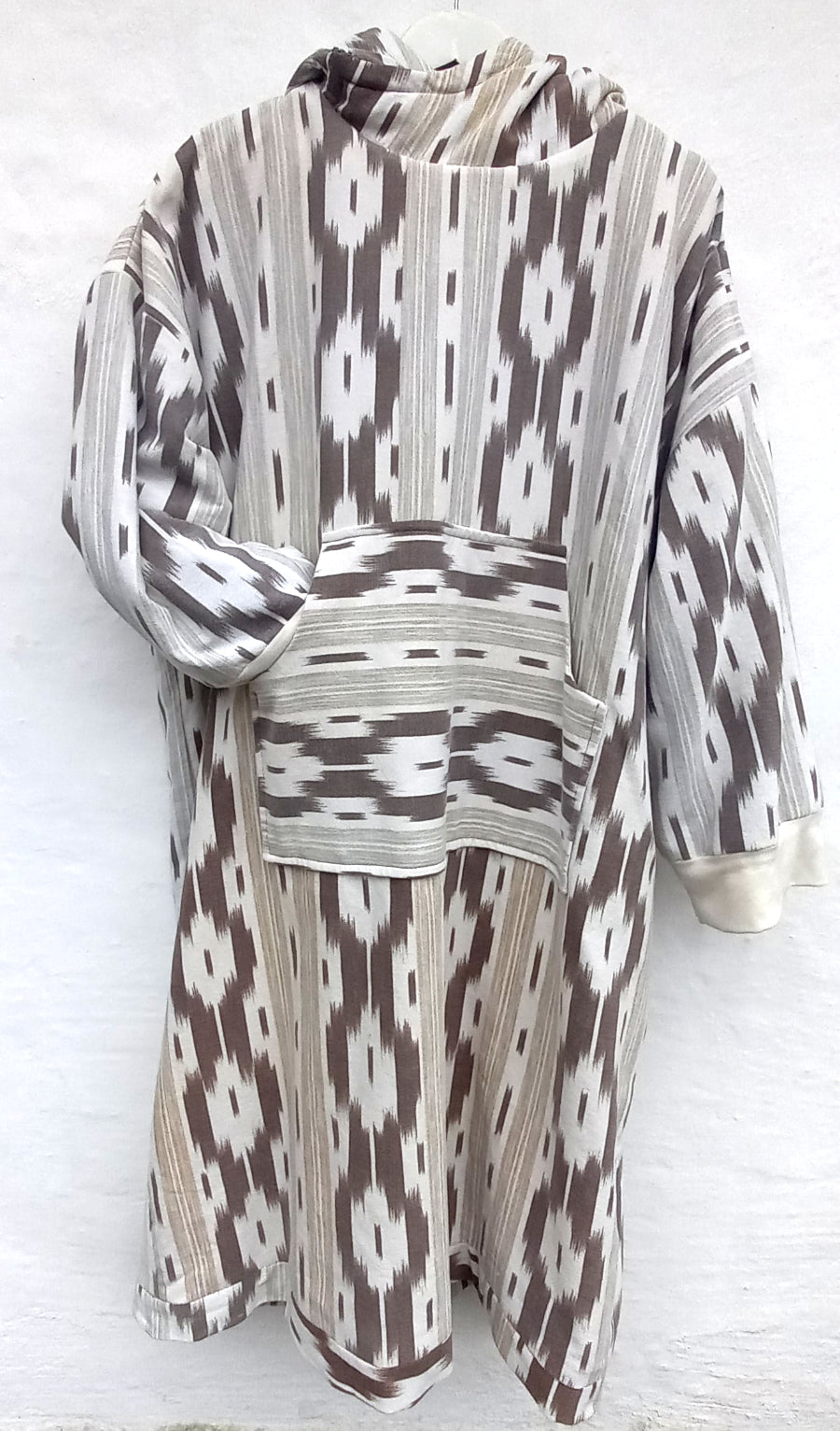 Quetzal bathrobe close-up of vintage Tela de Lenguas fabric detail
