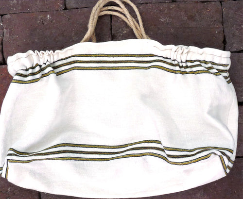 Cala Torta bag detail showing authentic Mallorcan textile from Bujosa
